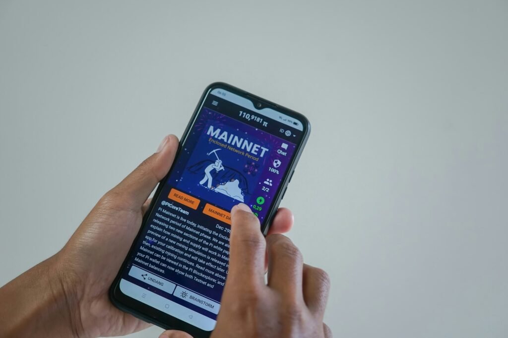 Earned Wage Access Apps Face New Rules in 2026: What Tapping Your Paycheck Early Really Costs Young professional checking an earned wage access app on a phone before payday